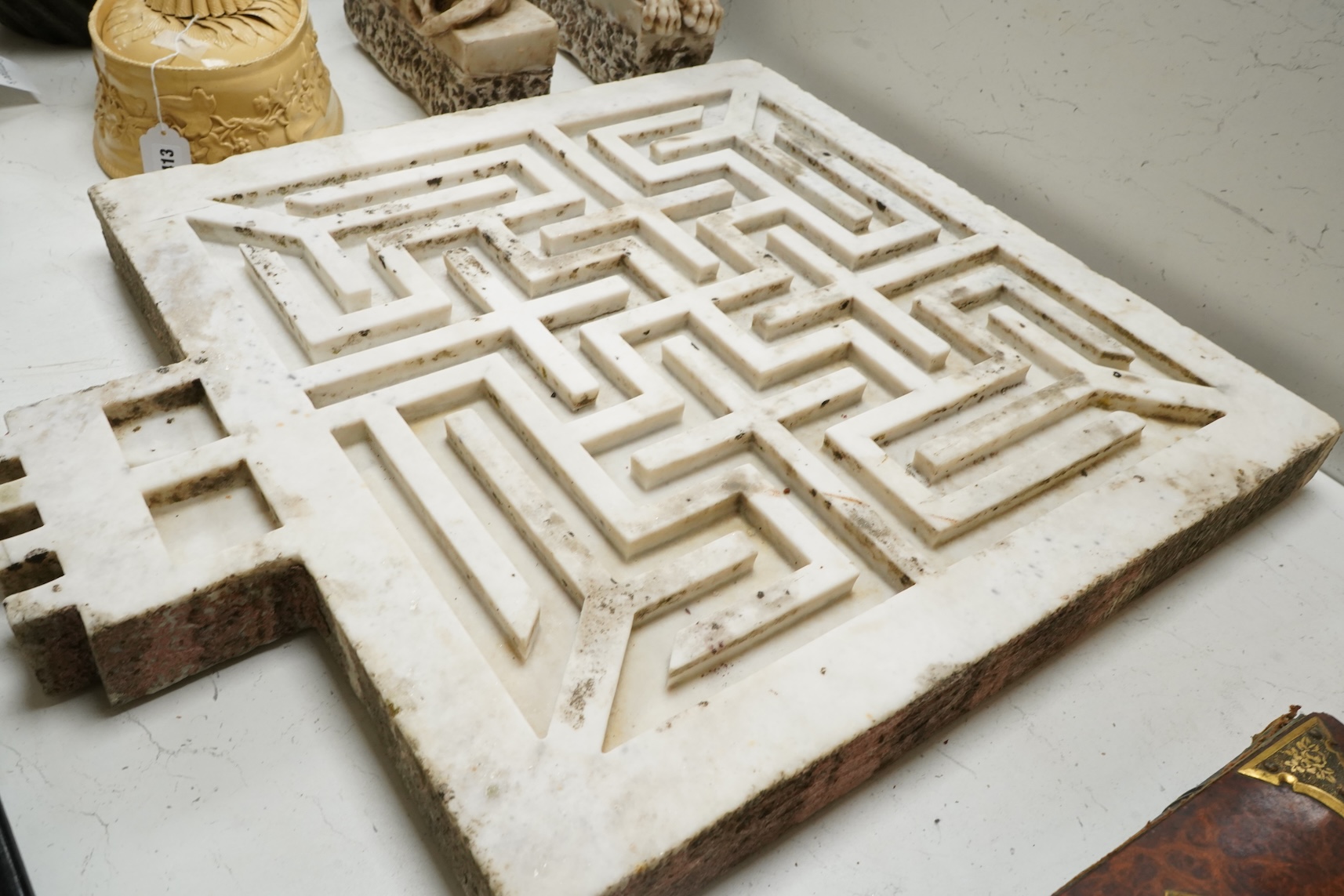 An 18th century Indian white marble rain catcher water maze or labyrinth, 72cm x 61cm